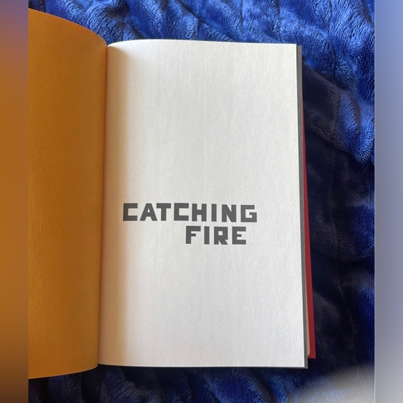 Catching Fire  Hardcover Book - Picture 2 of 6
